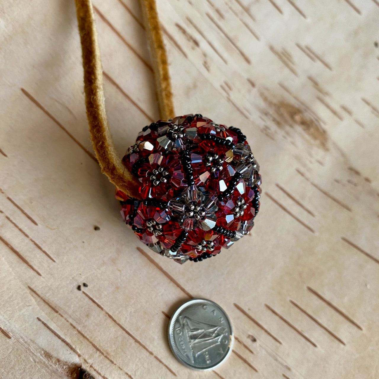 Beaded Red and Grey Ball on Narrow Moose Hide Strand
